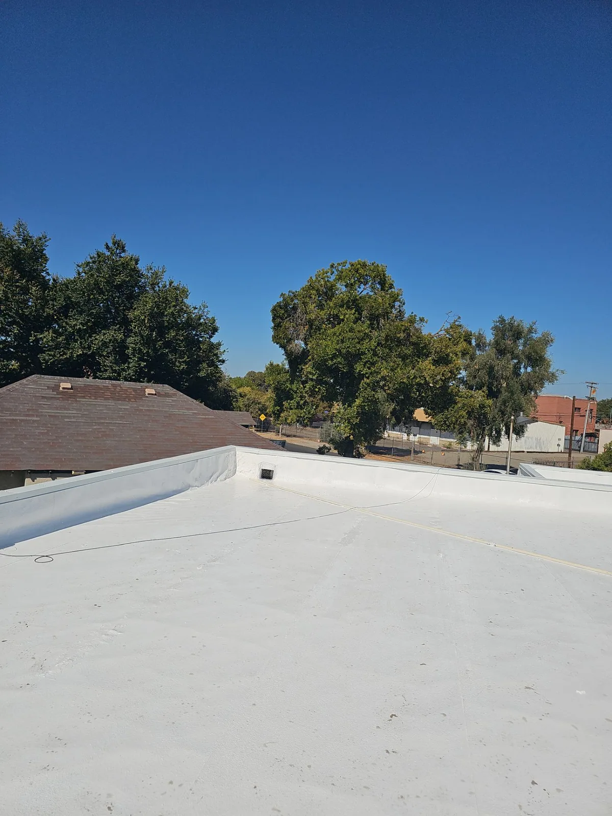 Completed elastomeric coating at Beto's Bakery, Modesto