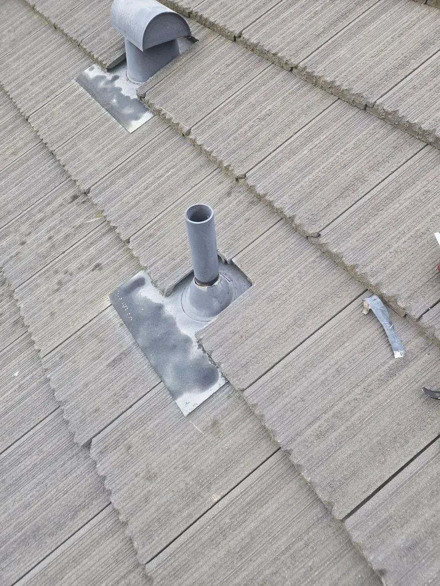 Gustine tile roof after repair — restored, properly seated roof tiles