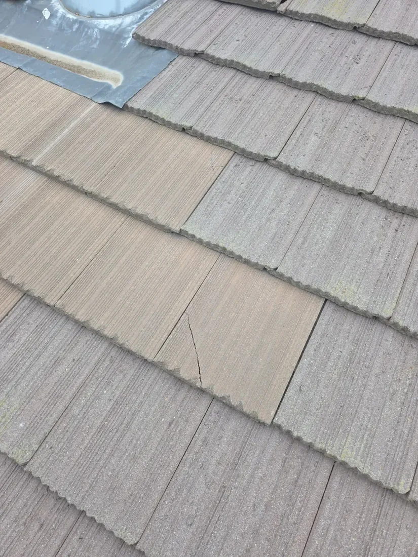 Hilmar tile roof before repair — cracked and displaced roof tiles
