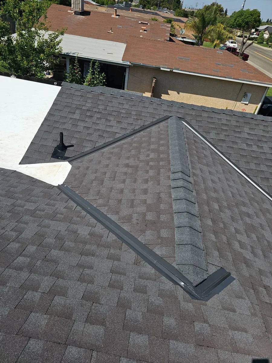 Livingston home after a full tear-off and re-roof — finished new shingle roof